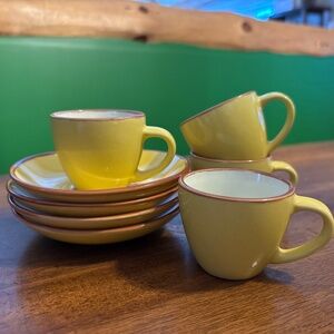 Imusa set of 4 yellow espresso cups with saucers.